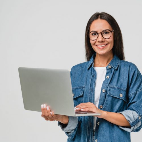 Young,Smiling,Caucasian,Student,Freelancer,Woman,Using,Laptop,For,Remote Young,Smiling,Caucasian,Student,Freelancer,Woman,Using,Laptop,For,Remote
